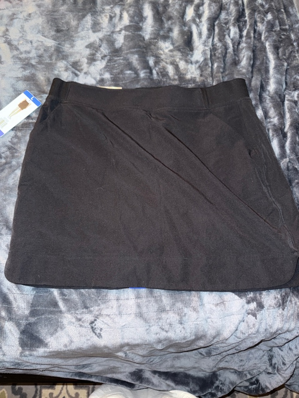 Black Mini Skirt with Subtle Draped Detail